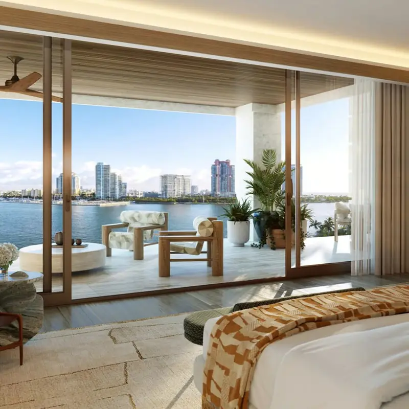 Primary bedroom overlooking the water